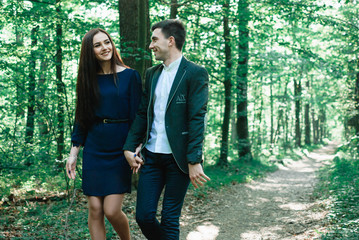 Young beautiful couple walking outdoor