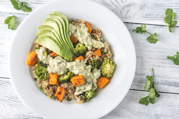Quinoa salad with roasted vegetables and fresh avocado
