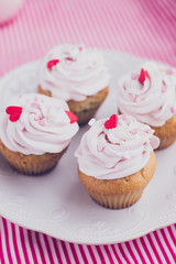 Muffins with pink cream