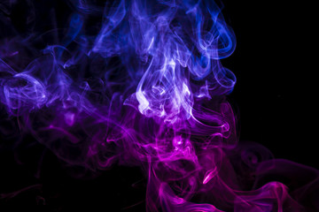 Colored smoke on black background
