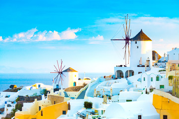 Picturesque summer sunset on the famous Greek resort Oia, Greece, Europe