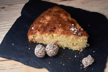 Delicious fresh baked piece of apple pie on shale board