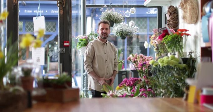 Male Florist working in store