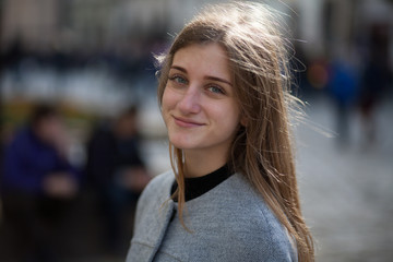 Portrait young businesswomen in gray