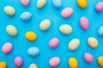 Easter traditional objects isolated on blue background colorful eggs