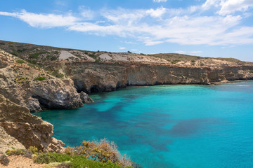 Fototapeta na wymiar Tsigrado beach, one of the most beautiful southern beaches of Milos island. Cyclades, Greece.