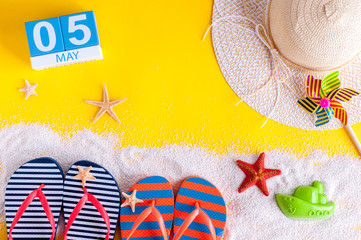 May 5th. Image of may 5 calendar with summer beach accessories. Spring like Summer vacation concept