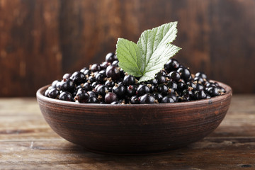 currant on a wooden background
