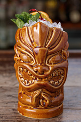 tiki glass of cocktail with ice