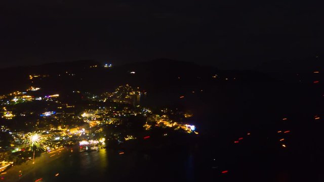 night illuminated phuket island beach new year holiday aerial panorama 4k timelapse thailand
