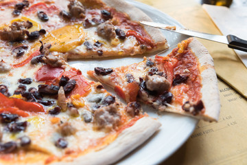 Neapolitan pizza sausage with peppers and mushrooms