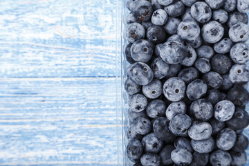bog whortleberry scattered on wooden background