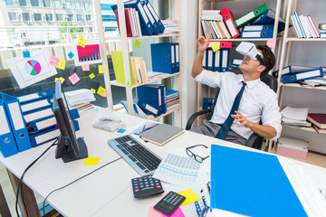 Employee watching movie on vr virtual reality glasses