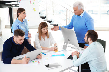 Office employees having argument during business meeting