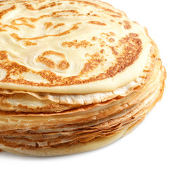 Stack of thin pancake on white background