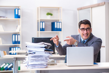 Overloaded with work employee under paperwork burden