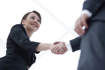background image of business partners handshaking.close-up.
