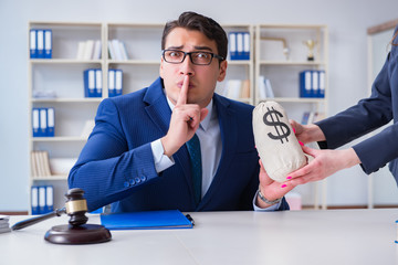 Judge in bribe concept with money
