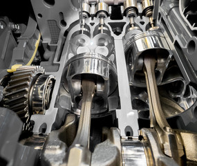 Inside view of 4 stroke engine cylinders, pistons and valves