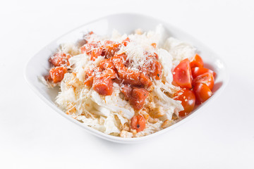 Vegetable salad with cheese. Pickled tomatoes, croutons, green salad, with cherry tomatoes and mixed greens