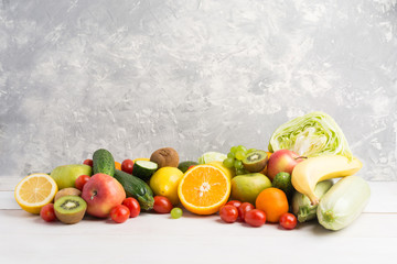 Fruits and vegetables with grey background and copy space