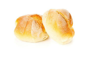 Two whole, fresh baked wheat buns