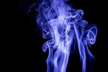 Blue smoke on black background