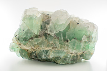 Green gemstone natural mineral fluoride or green beryl isolated