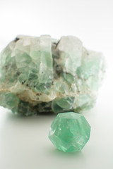 Green gemstone natural mineral fluoride or green beryl isolated