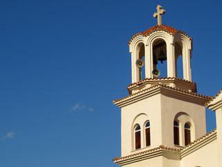 Fototapeta na wymiar Bell Tower of The St. Paraskevi Church in Paralia Katerinis, Greece