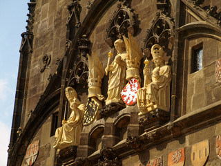 Obraz premium Statues and details of The Old Town Bridge Tower In Prague, Czech Republic