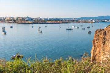View to the yacht marina of Portimao. View from the beach of the Molhe in Ferragudo, Algarve