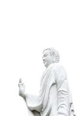 Statue Of Buddha standing with raised right arm gesture of Vitarka Mudra isolated on white. Pacified and obtained enlightenment Buddha showing Dispute, Explaining Teaching Transmission
