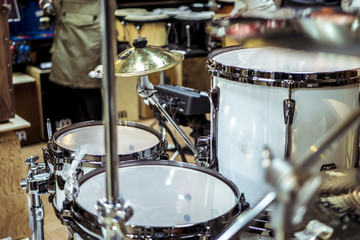 close up live classic white drum set in the studio