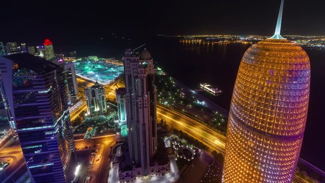 night illuminated doha city famous tower rooftop downtown bay panorama 4k timelapse qatar
