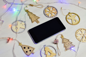 Mobile Phone in Xmas Decoration, Mockup Top View Display Background. Communication Technology Lifestyle