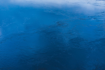Fototapeta na wymiar texture of blue water on the whole frame