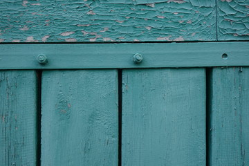 Old plank wooden wall background. The texture of old wood. Weathered piece of wood.