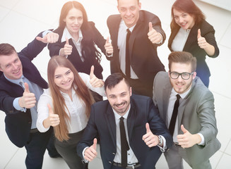 successful business team holding up a thumbs up