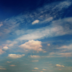 Background from the dramatic sky with clouds in blue tones.