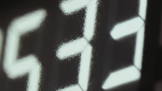 The electronic display on the petrol station shows and counts the cost and quantity