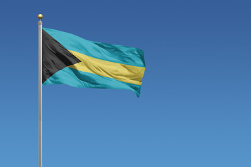 Bahamas flag on a clear blue sky day
