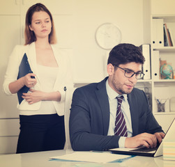 Frustrated businessman with angry chief
