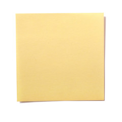 One single yellow square sticky post it note isolated on white background photo