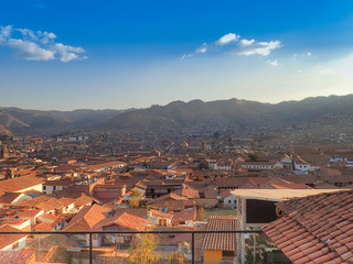 Aerial view of the red tiled roofs of buildings in Cusco, Peru
