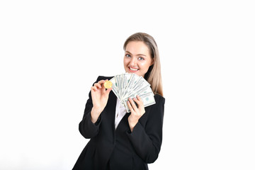 bit-coin business concept. Beautiful businesswoman is counting her money. Young business are enjoying the money and earning. Young business are happy and is saving money with the bitcoin