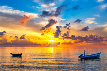 Colorful sunrise over ocean on Maldives