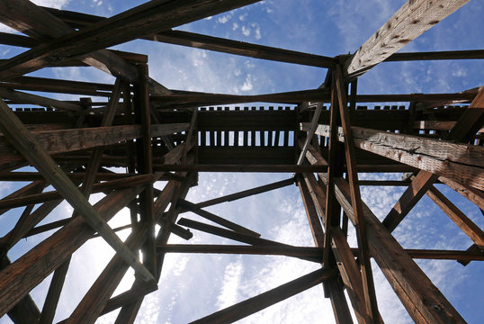 Looking up at old obsolete railroad bridge in Arizona, USA