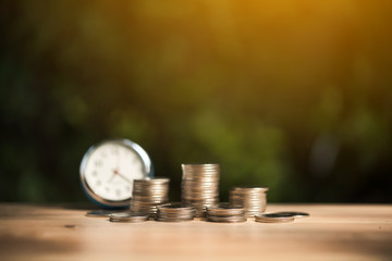 Saving to buy a house or home savings concept with money coin stack growing.Saving money concept.