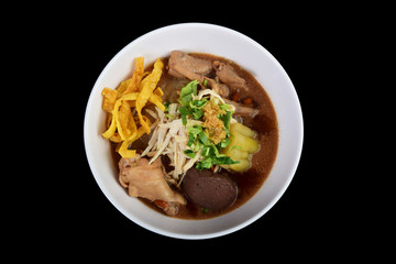 Thai chicken noodles soup with bitter gourd